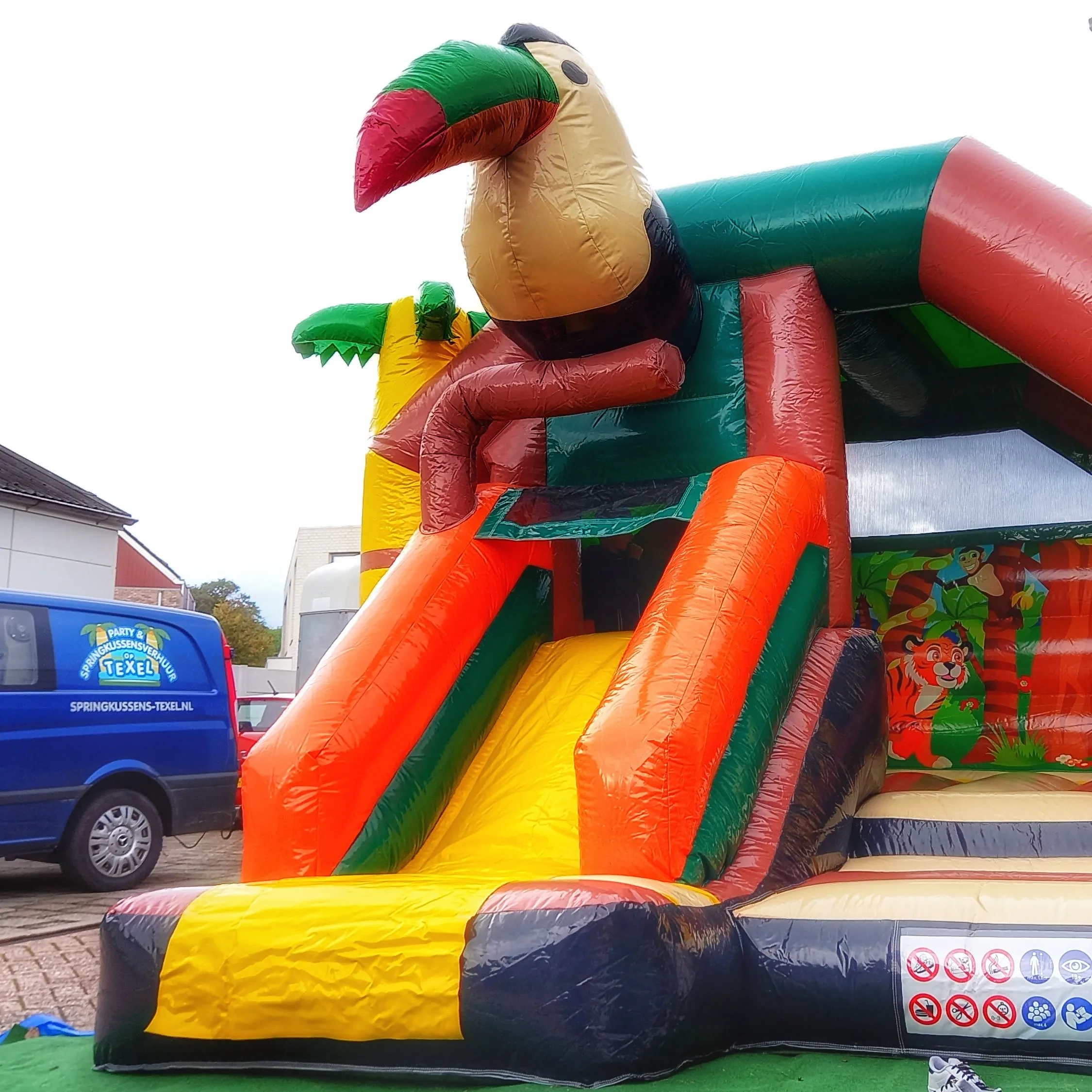 Springkussen Toekan met glijbaan